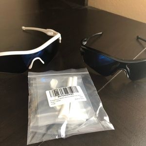Two Oakley radar path sunglasses with ear socks